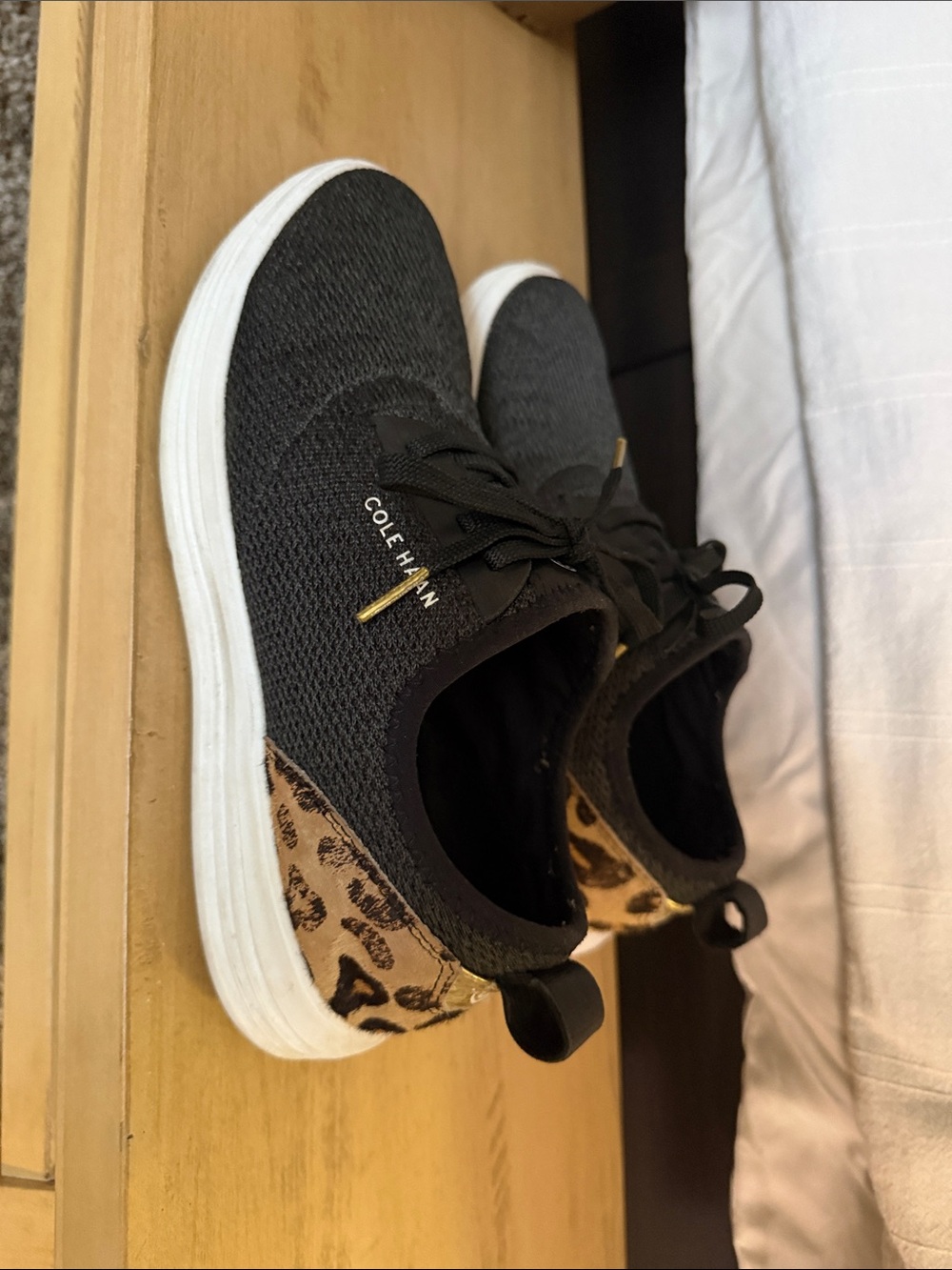 Cole Haan Black Knit Sneakers with Leopard Heel Accent